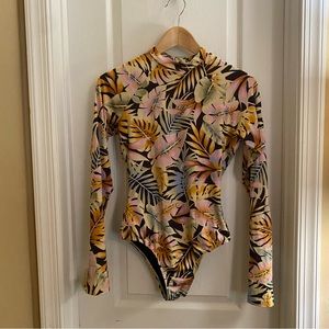 Surf suit long sleeve swimsuit one piece gently used size unknown